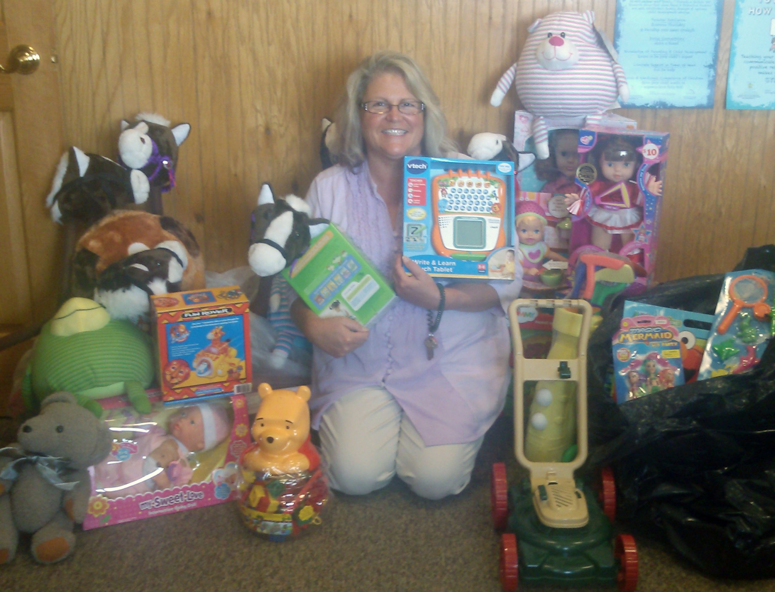 Red Hat Mackinaw toy donation 2013